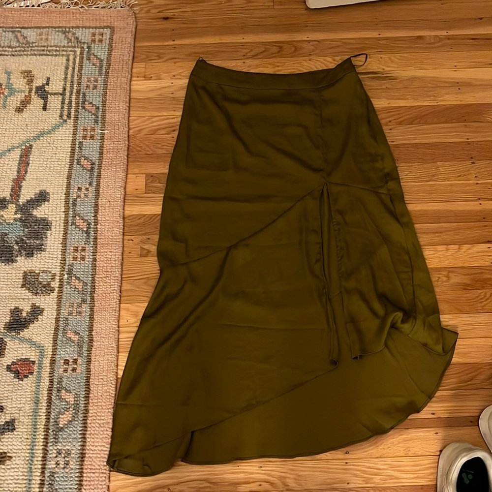 Free People asymmetrical Olive colored skirt. Never worn.